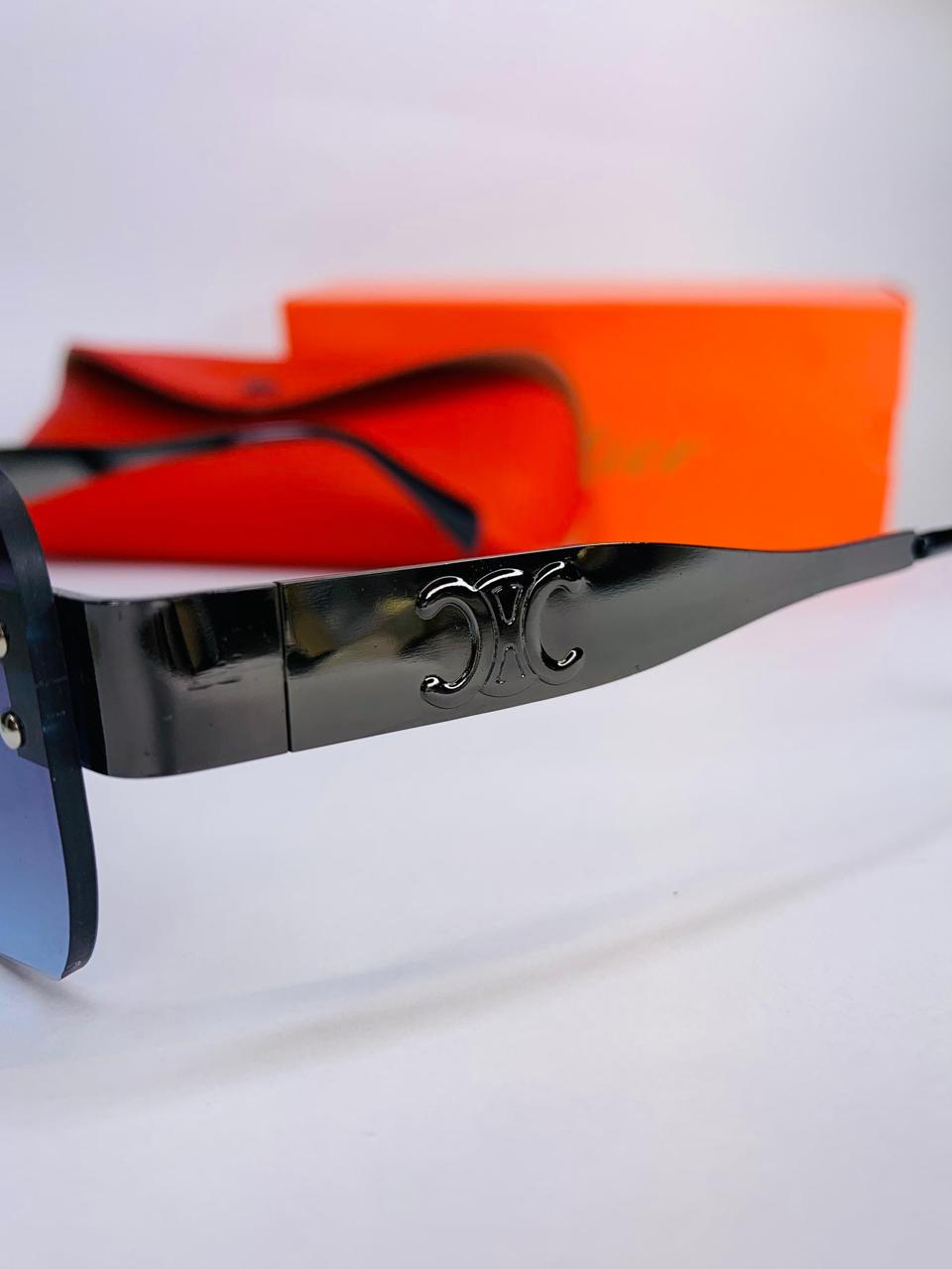 Gucci Rimless Sunglasses – Luxury Black Frame with Blue Gradient Lenses